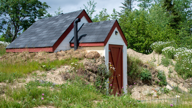 a modern root cellar in a hillside